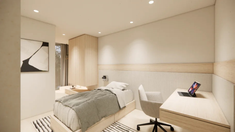 Bedroom 2 with wardrobes, desk space and garden light
